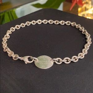 Tiffany & Co. “Please Return to Tiffany” Oval Tag